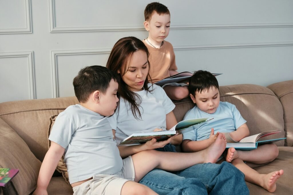 Mother reading stories to her kids.