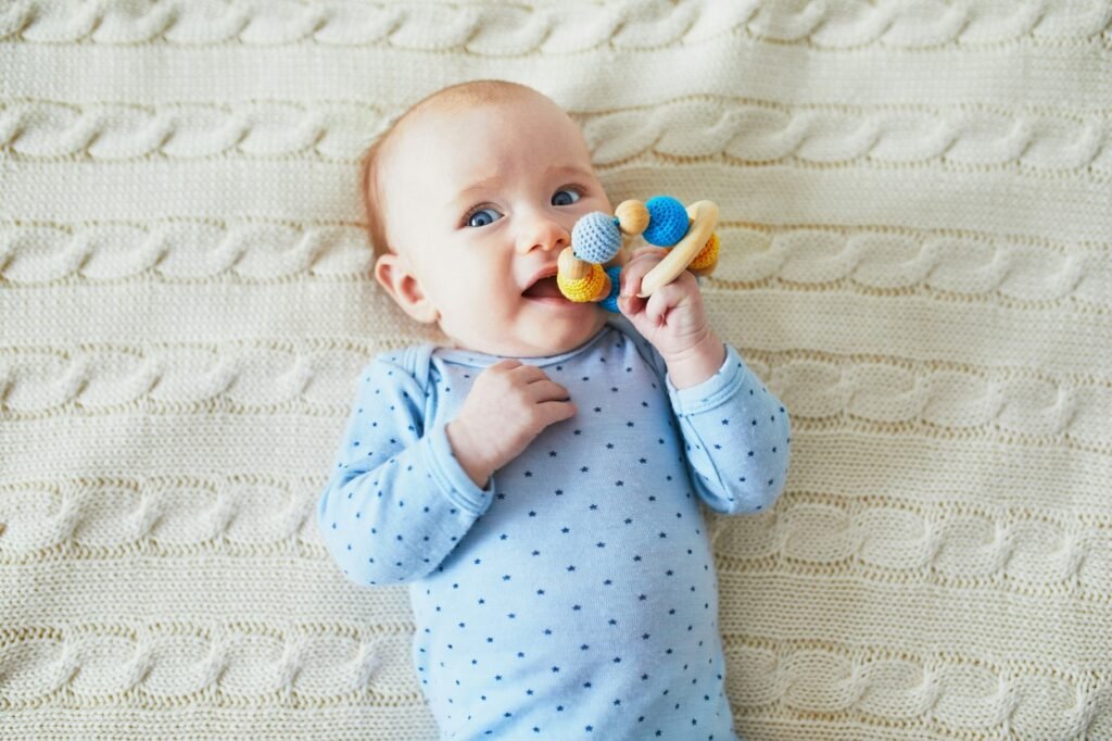 Baby in a cute blue dress.