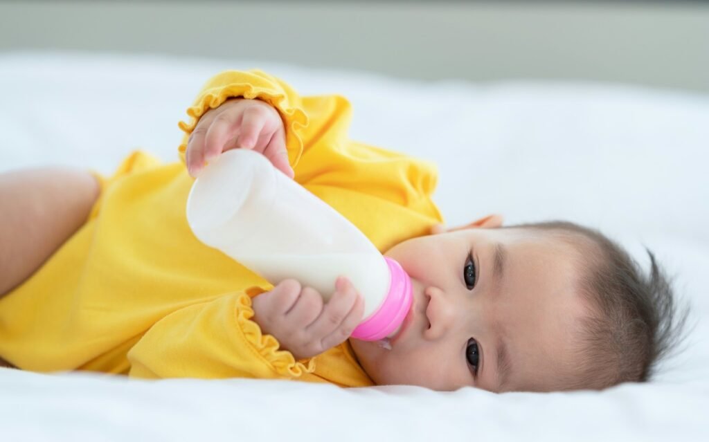 Baby having formula milk.