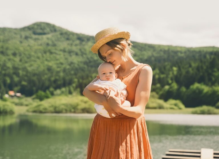 Beautiful mother with her adorable baby.