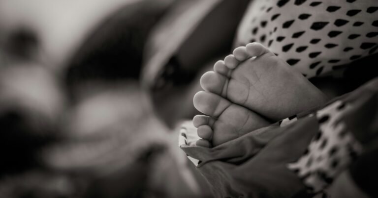 Feet of a newborn.