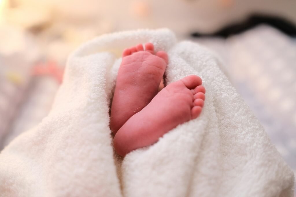 Newborn's feet.
