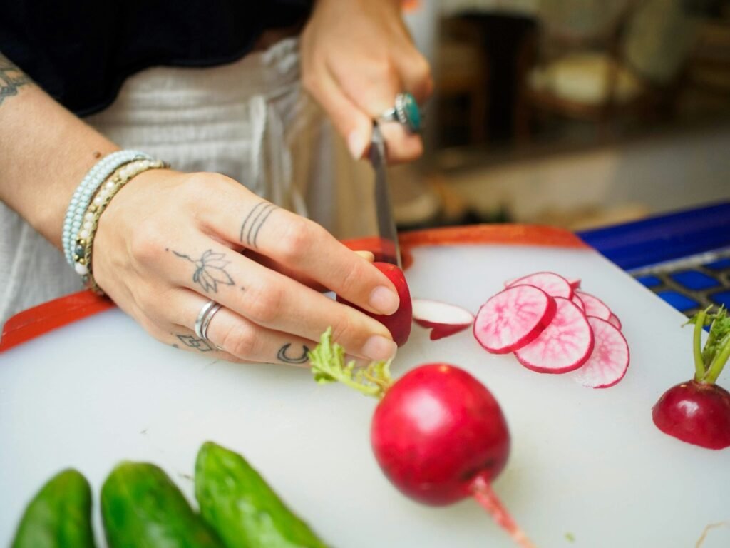 A person chopping veggies.