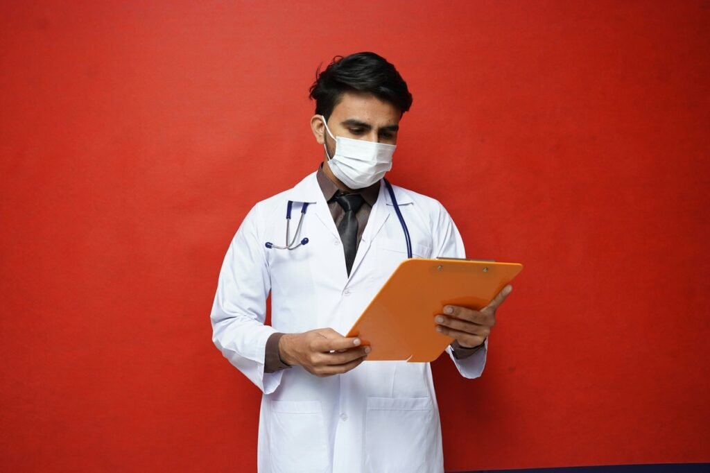 A doctor holding a clipboard.